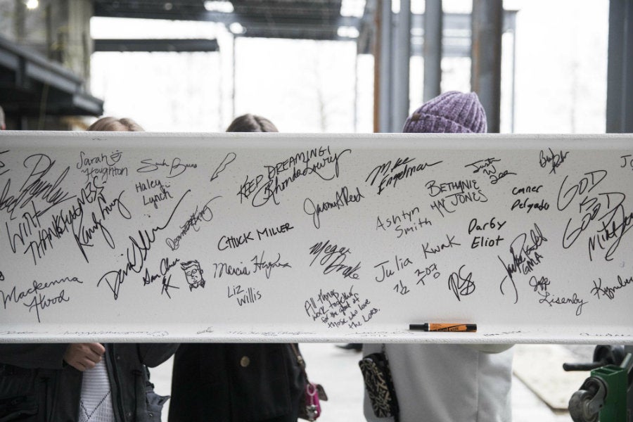 Shinn Event Center topping out ceremony marks project milestone University